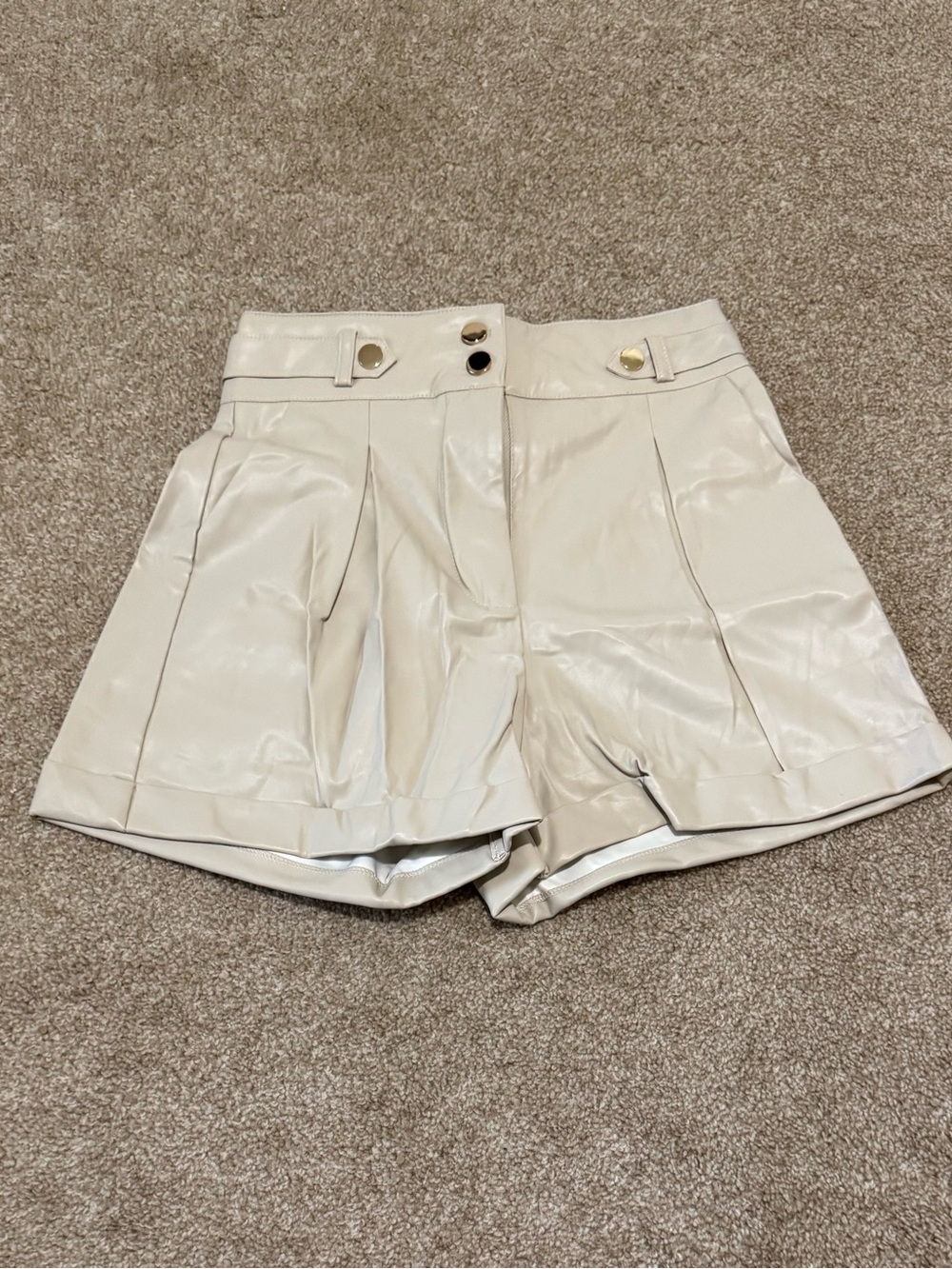 High-Waist Cream Pleated Faux-Leather Shorts with Gold Buttons